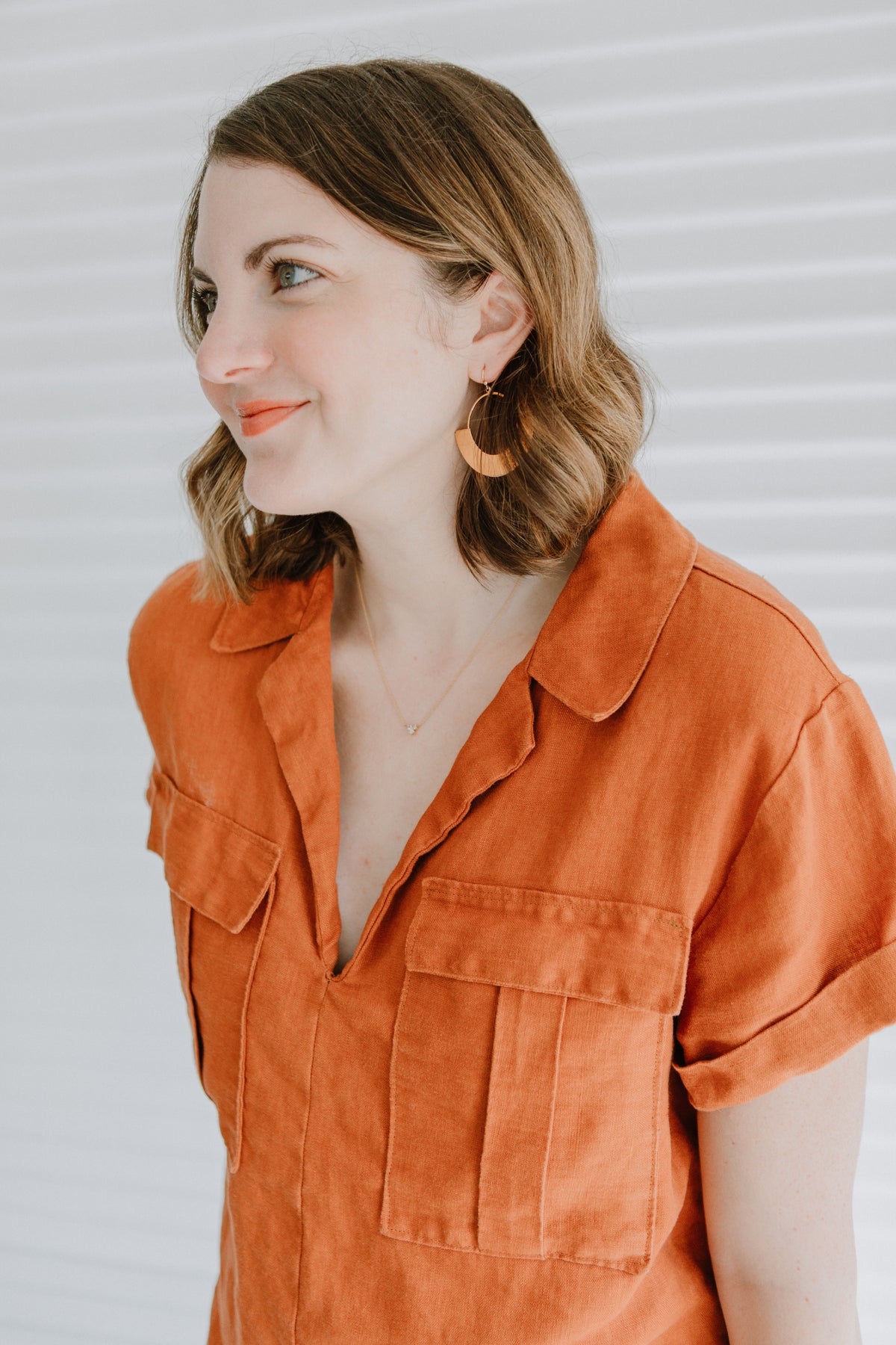 Sew to Grow Sydni Shirtdress PDF sewing pattern, model in an orange shirt top