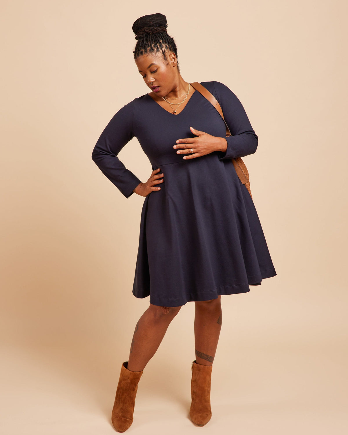 Cashmerette Turner Dress PDF sewing pattern, woman wearing a navy blue dress with long sleeves