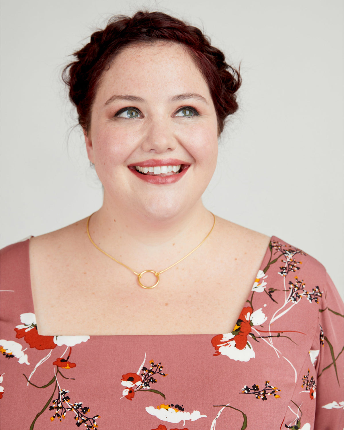 Cashmerette Upton Dress and Skirt Plus expansion pack PDF sewing pattern, woman wearing a floral dress, smiling close-up