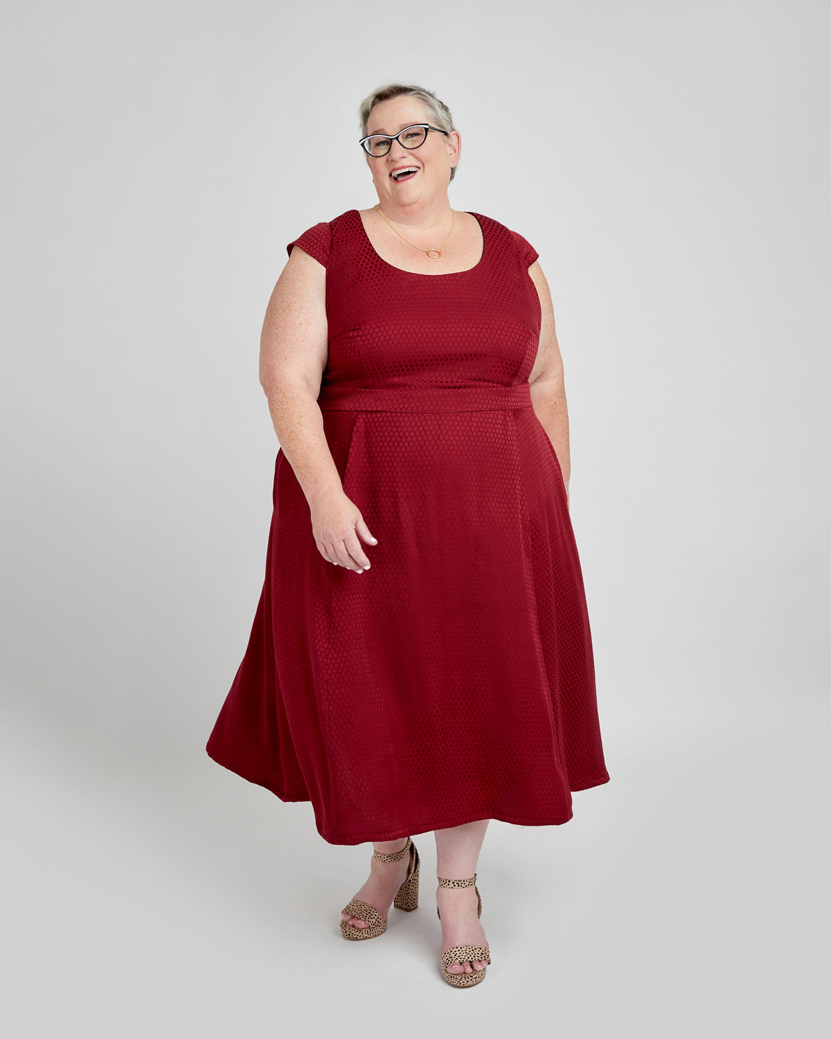 Cashmerette Upton Dress and Skirt Plus expansion pack PDF sewing pattern, woman wearing a red dress