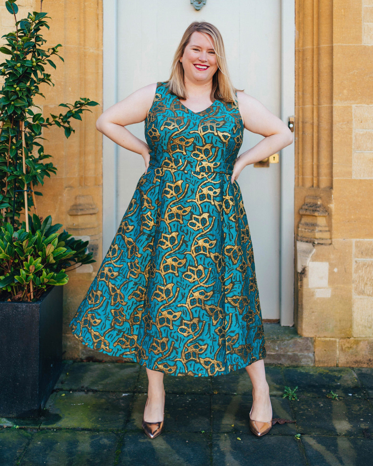 Cashmerette Upton Dress and Skirt Plus expansion pack PDF sewing pattern, woman wearing a blue and gold patterned dress standing outdoors