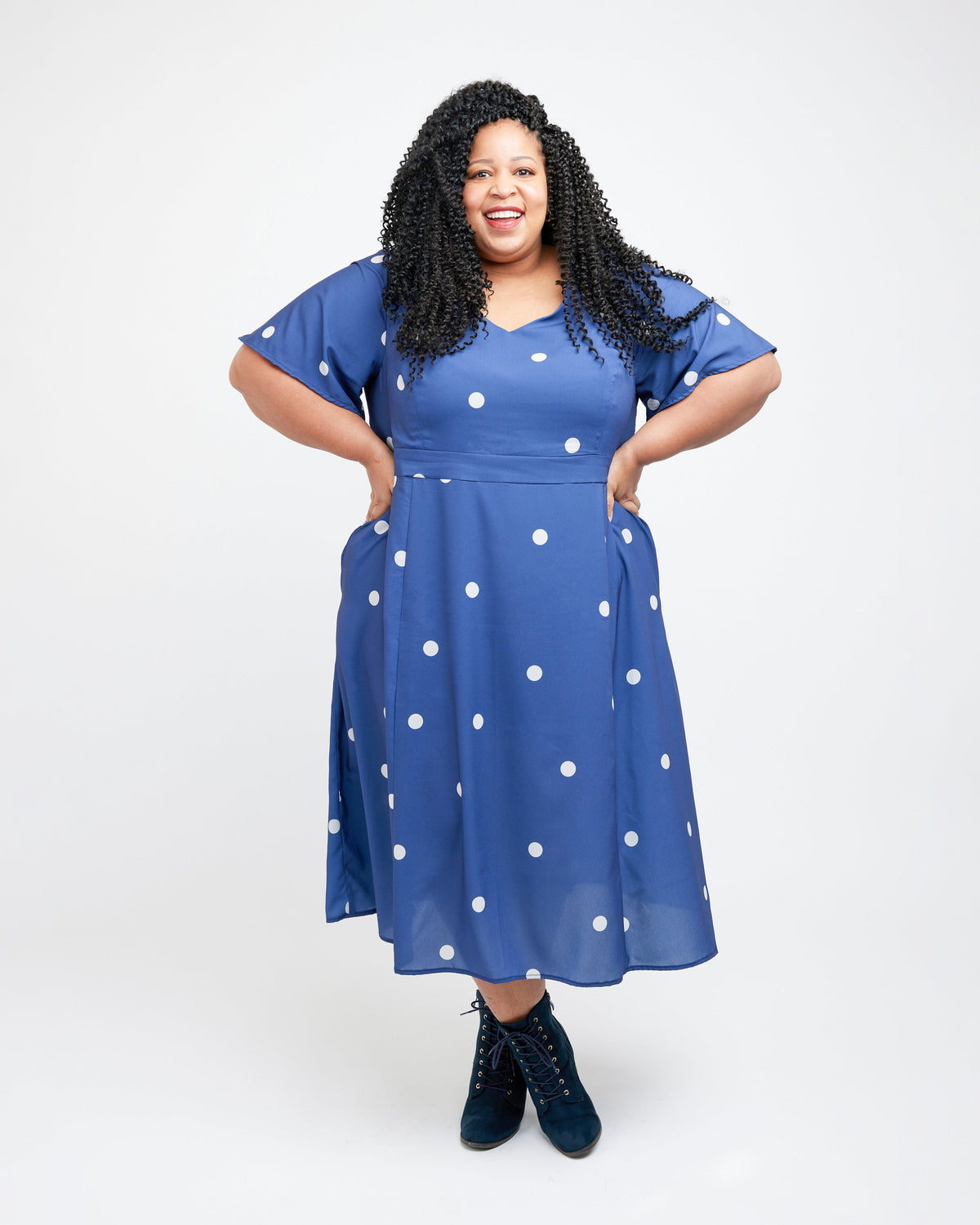 Cashmerette Upton Dress and Skirt Plus expansion pack PDF sewing pattern, woman wearing a blue dress with white polka dots, blue floral front