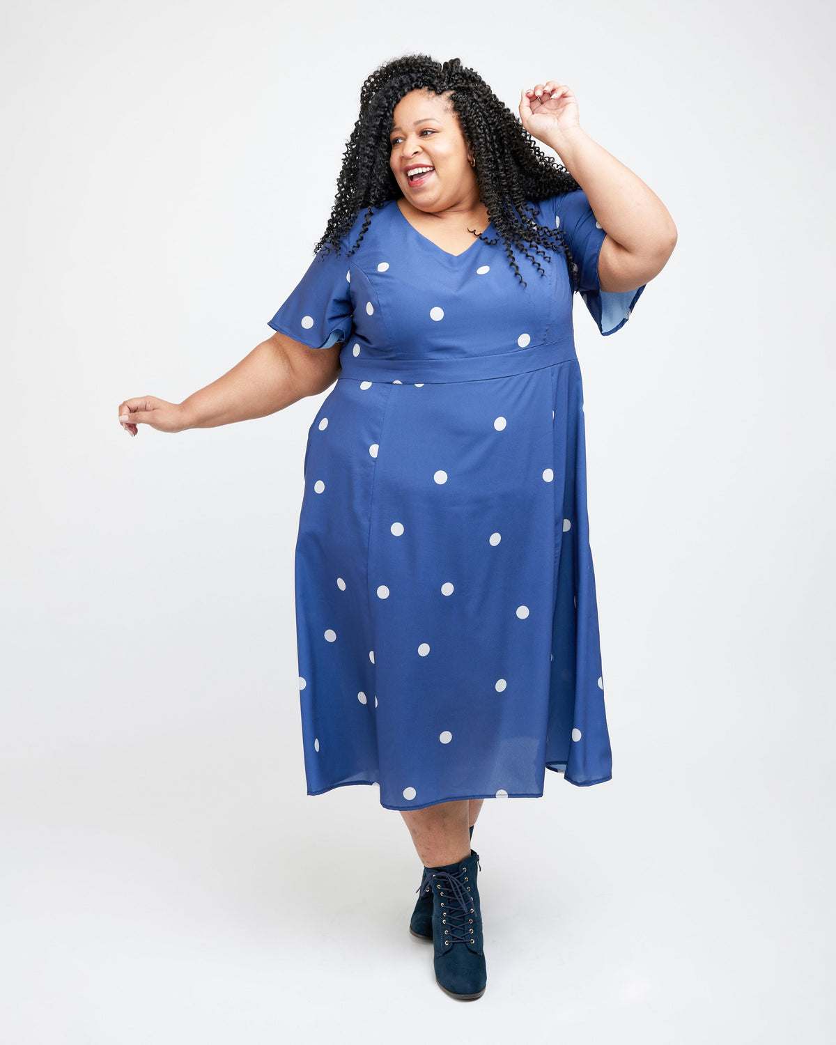 Cashmerette Upton Dress and Skirt Plus expansion pack PDF sewing pattern, woman wearing a blue dress with white polka dots, blue floral side