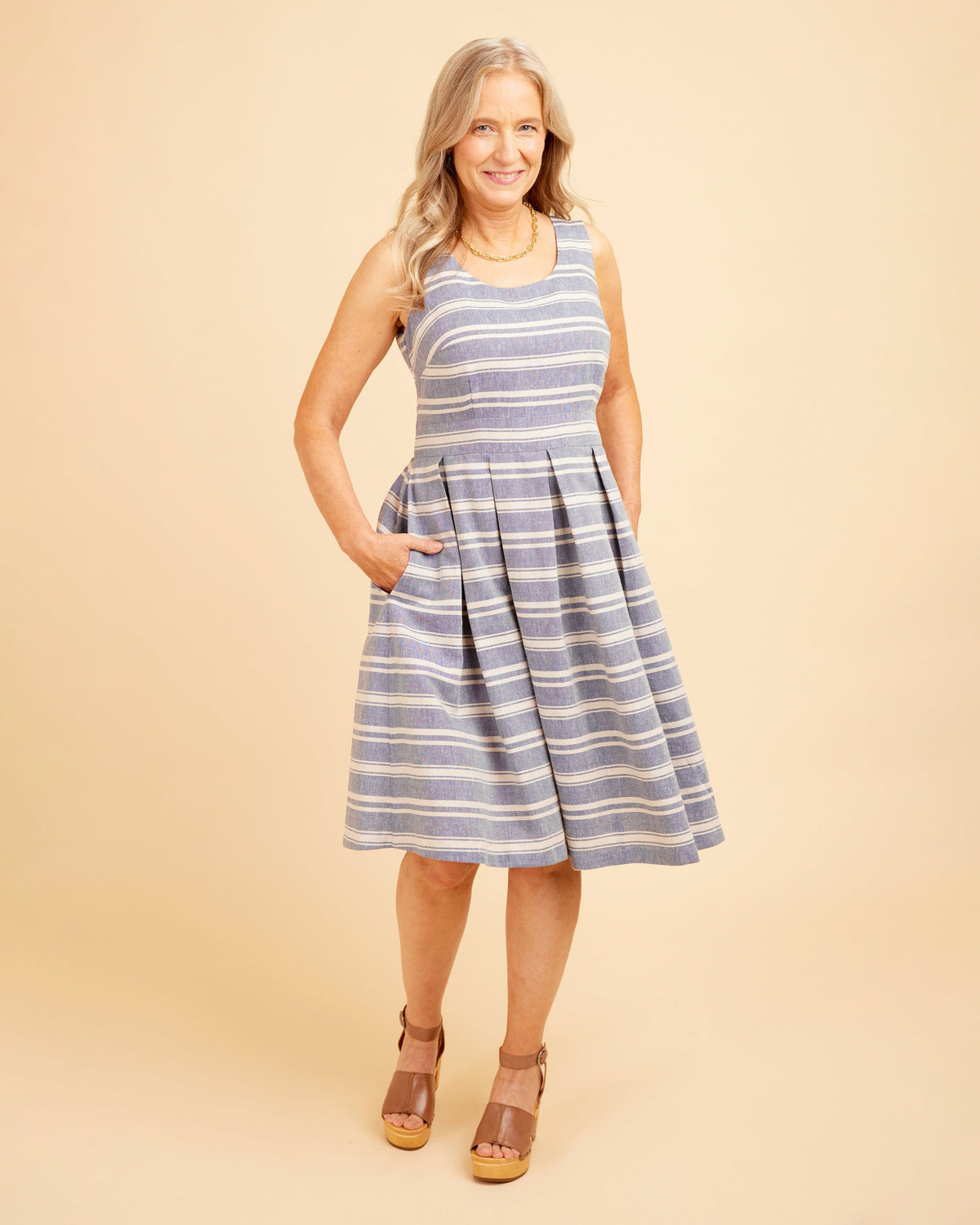 Cashmerette Upton Dress and Skirt Plus expansion pack PDF sewing pattern, woman wearing a blue and white striped dress, lilac gingham