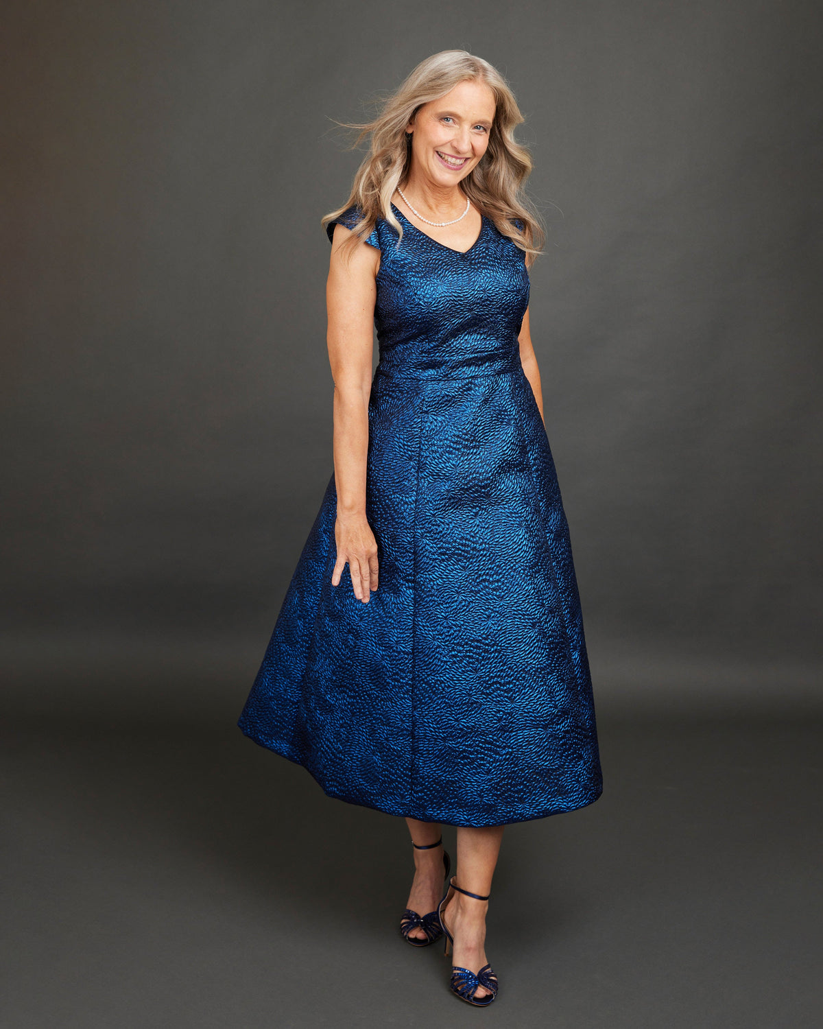 Cashmerette Upton Dress and Skirt Plus expansion pack PDF sewing pattern, woman wearing a blue dress, denim blue version