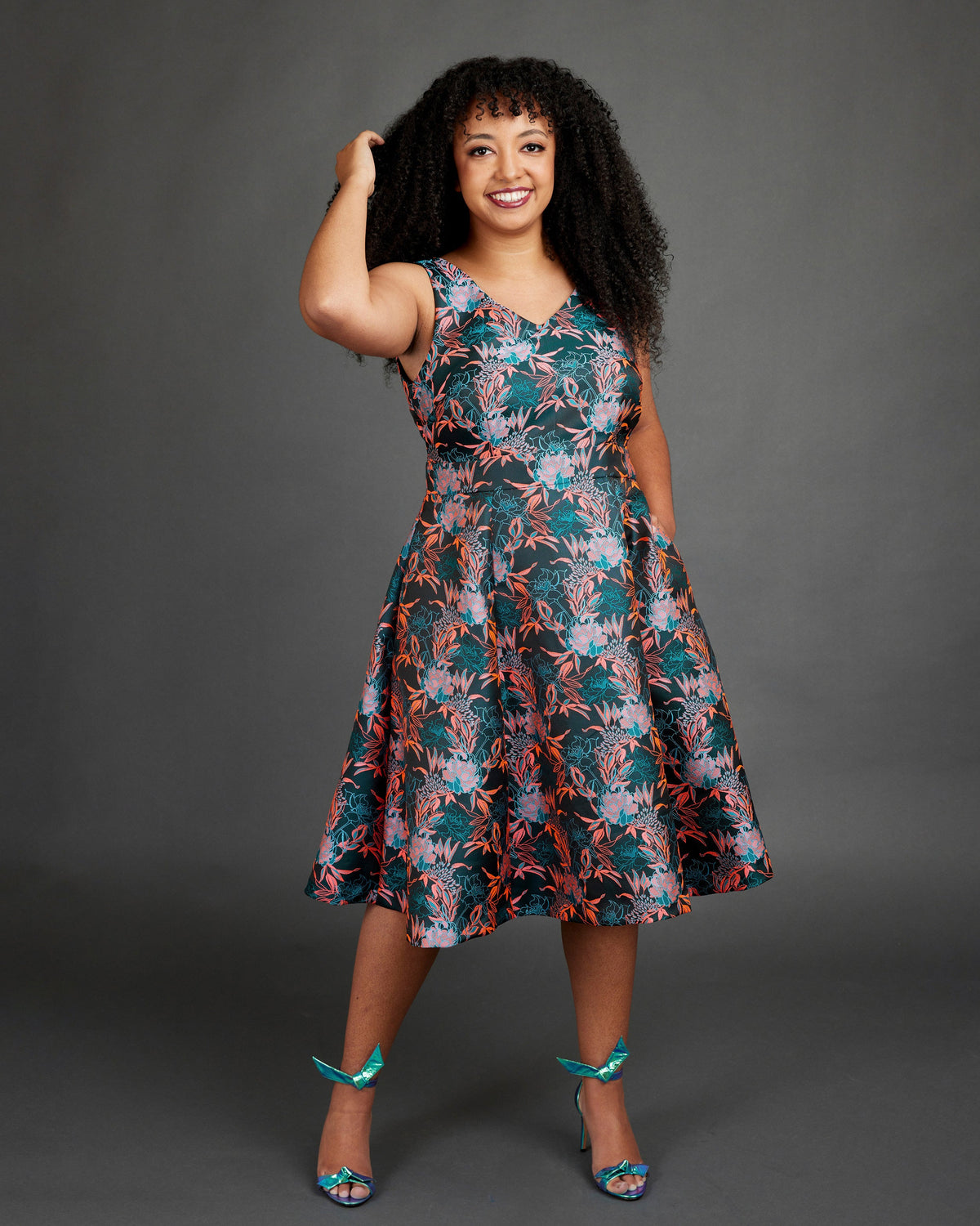 Cashmerette Upton Dress and Skirt Plus expansion pack PDF sewing pattern, woman wearing a floral dress, floral midi