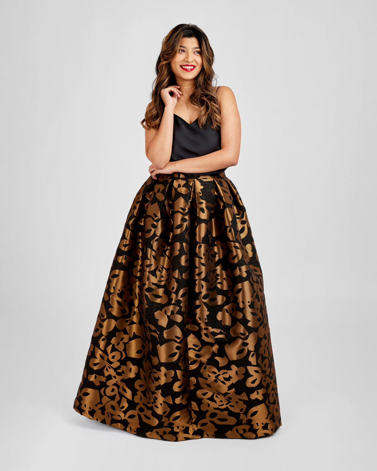 Cashmerette Upton Dress and Skirt Plus expansion pack PDF sewing pattern, woman wearing a black top and leopard print skirt, brown floral front