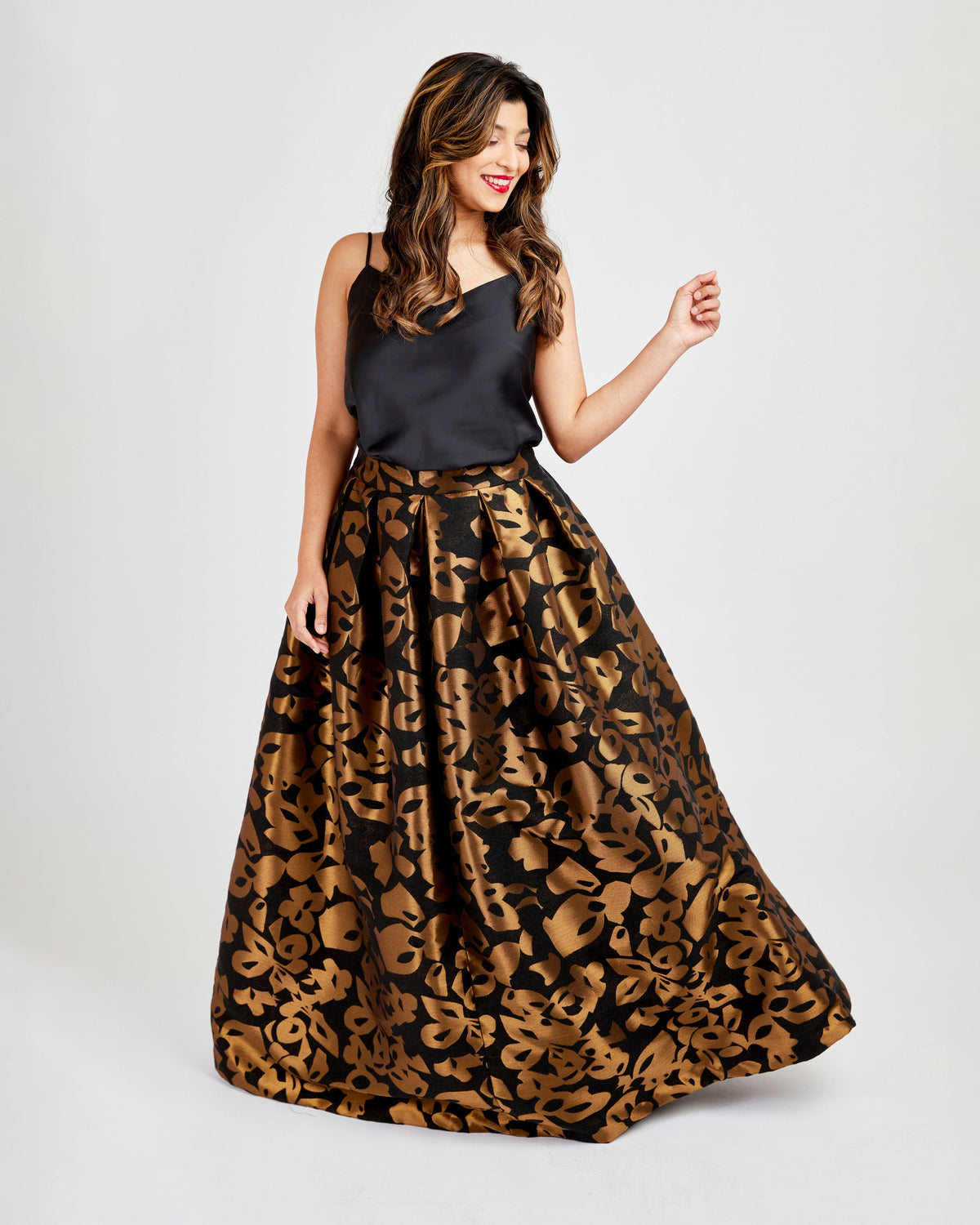 Cashmerette Upton Dress and Skirt Plus expansion pack PDF sewing pattern, woman wearing a black top and leopard print skirt, brown floral maxi