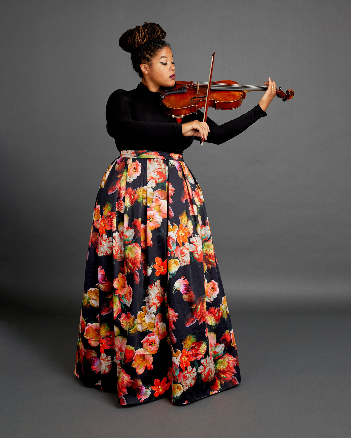 Cashmerette Upton Dress and Skirt Plus expansion pack PDF sewing pattern, person playing violin wearing a floral skirt