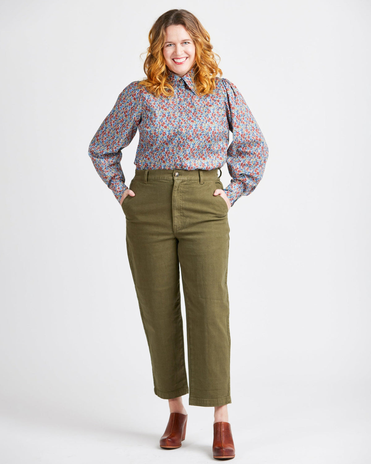 Cashmerette Vernon Shirt PDF sewing pattern, woman wearing a floral blouse and green pants, khaki trousers front