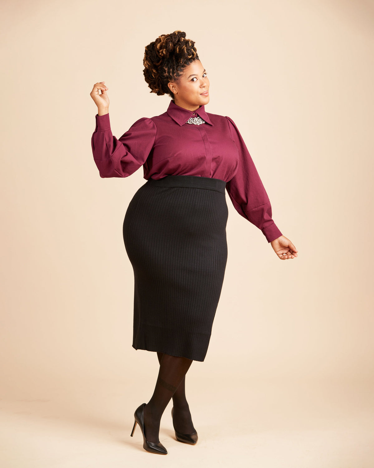 Cashmerette Vernon Shirt PDF sewing pattern, woman wearing a burgundy blouse and black skirt, burgundy front view
