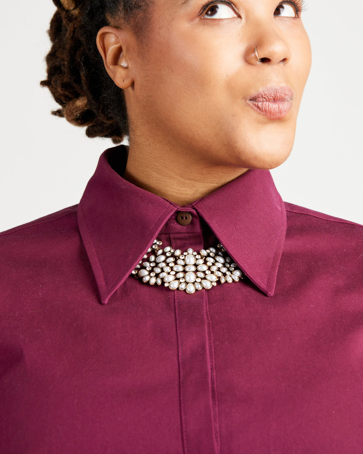 Cashmerette Vernon Shirt PDF sewing pattern, close-up of a person wearing a purple shirt with a pearl necklace