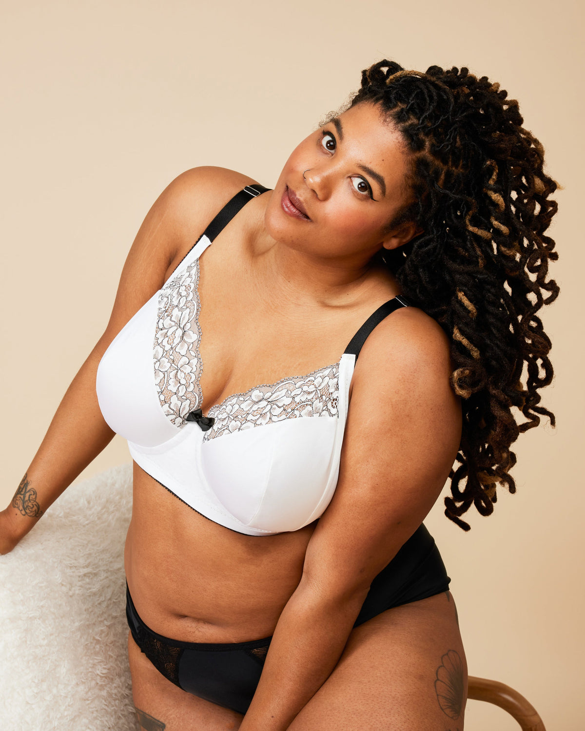 Cashmerette Willowdale Bra PDF sewing pattern, woman wearing a white bra with lace details and black underwear
