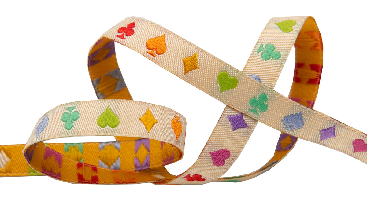 Renaissance Ribbons Suited and Booted ecru ribbon, 3/8 inch, by Tula Pink, unspooled