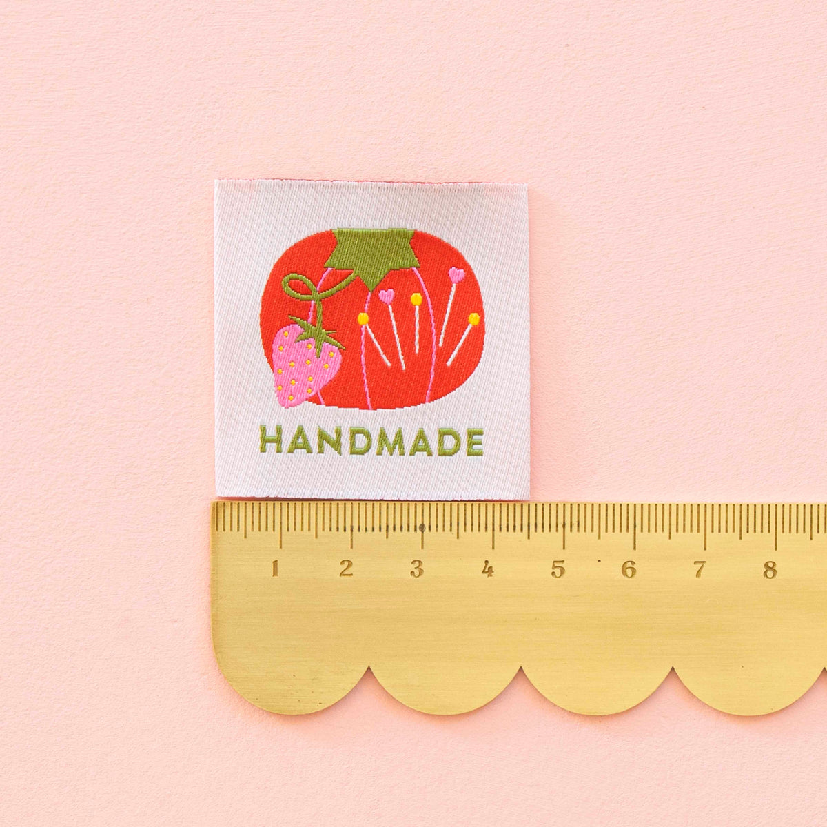 Sarah Hearts tomato Handmade large woven label on a yellow ruler to show size